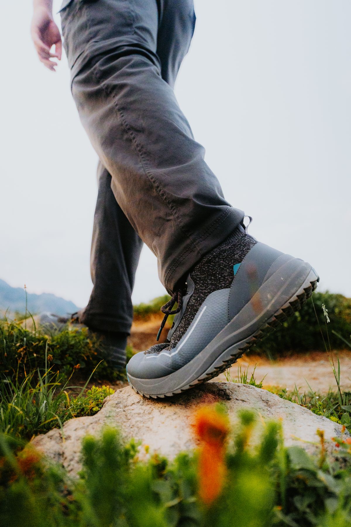 Hiking shoes on rocky terrain showing durable grip and support